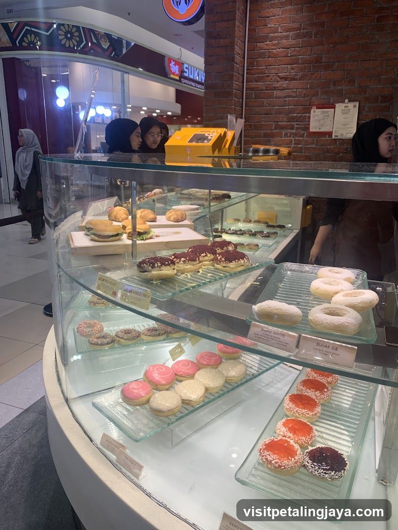 Donuts and pastries in a display case