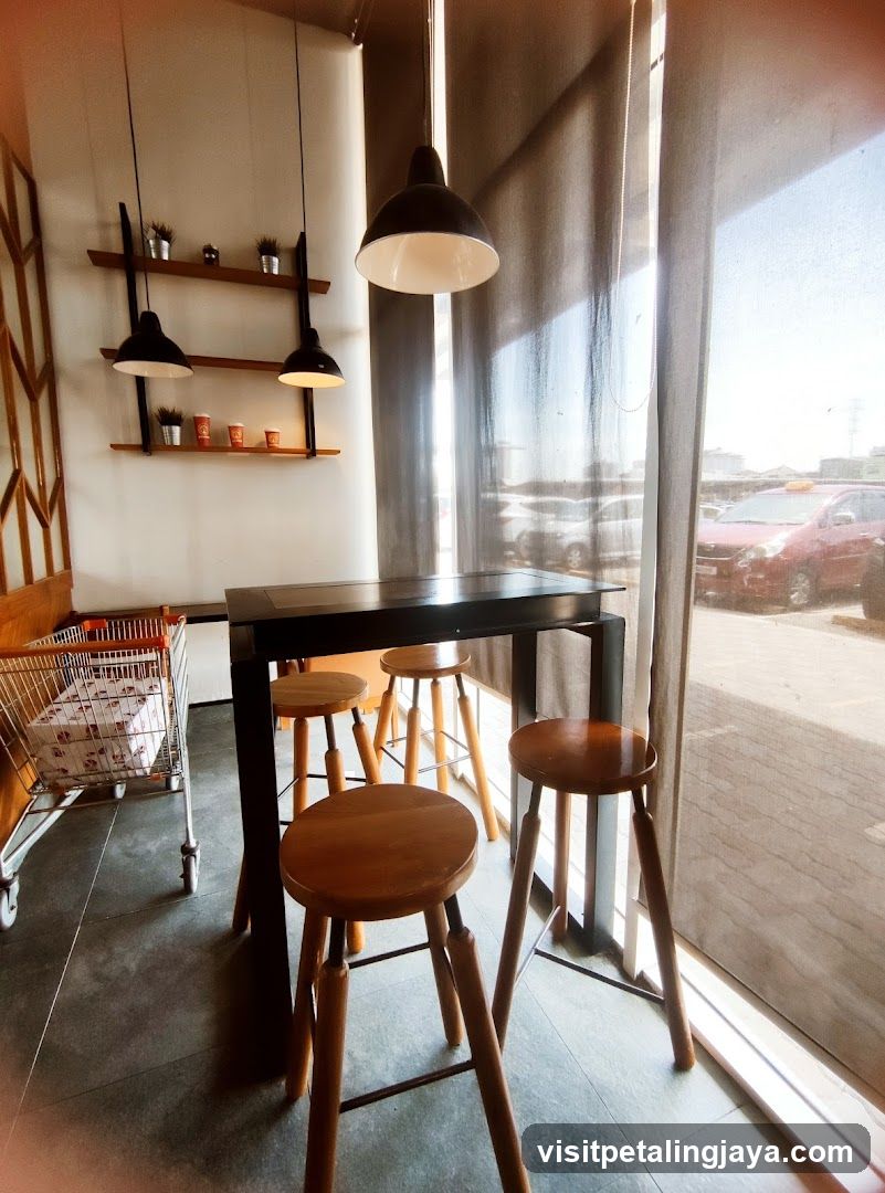 Cafe Interior with High Table and Stools