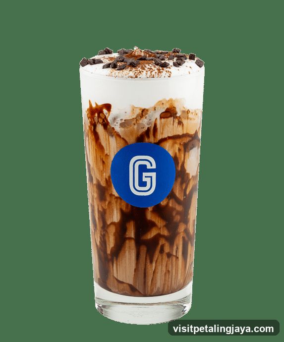 Chocolate drink with whipped cream and chocolate chips