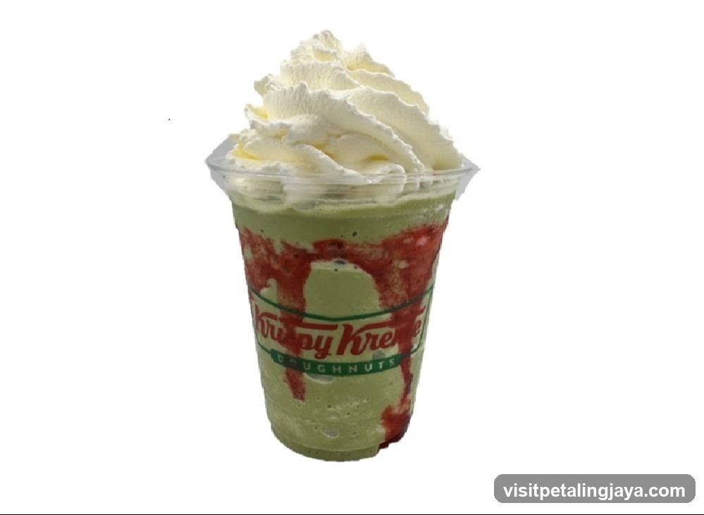 Green Frappe with Whipped Cream and Strawberry Drizzle
