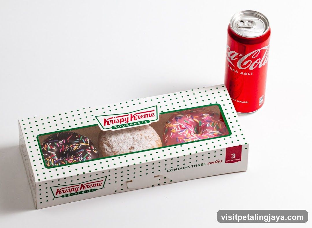 Krispy Kreme Doughnuts and Coca-Cola Can