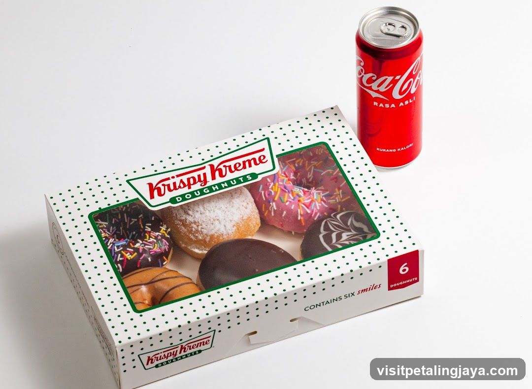Krispy Kreme Doughnuts Box and Coca-Cola Can