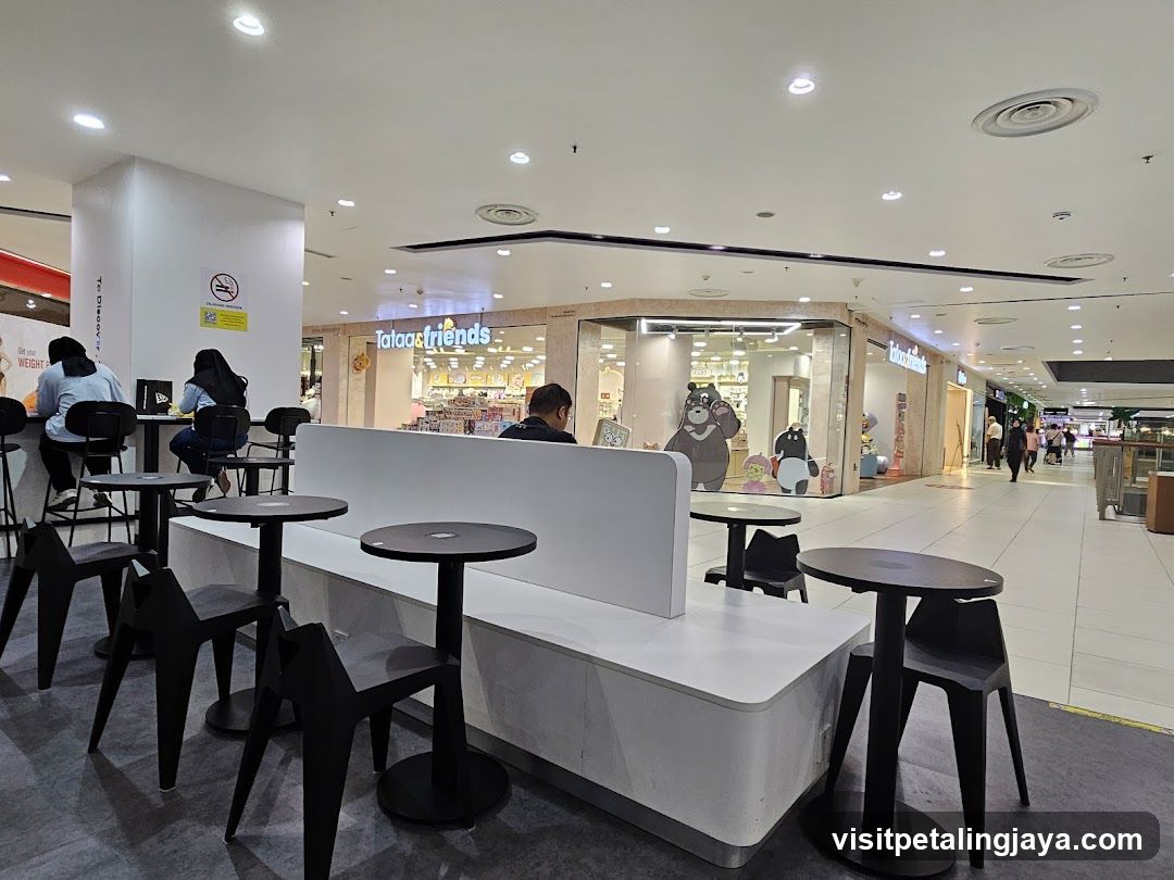 Mall Interior with Shops and Seating Area