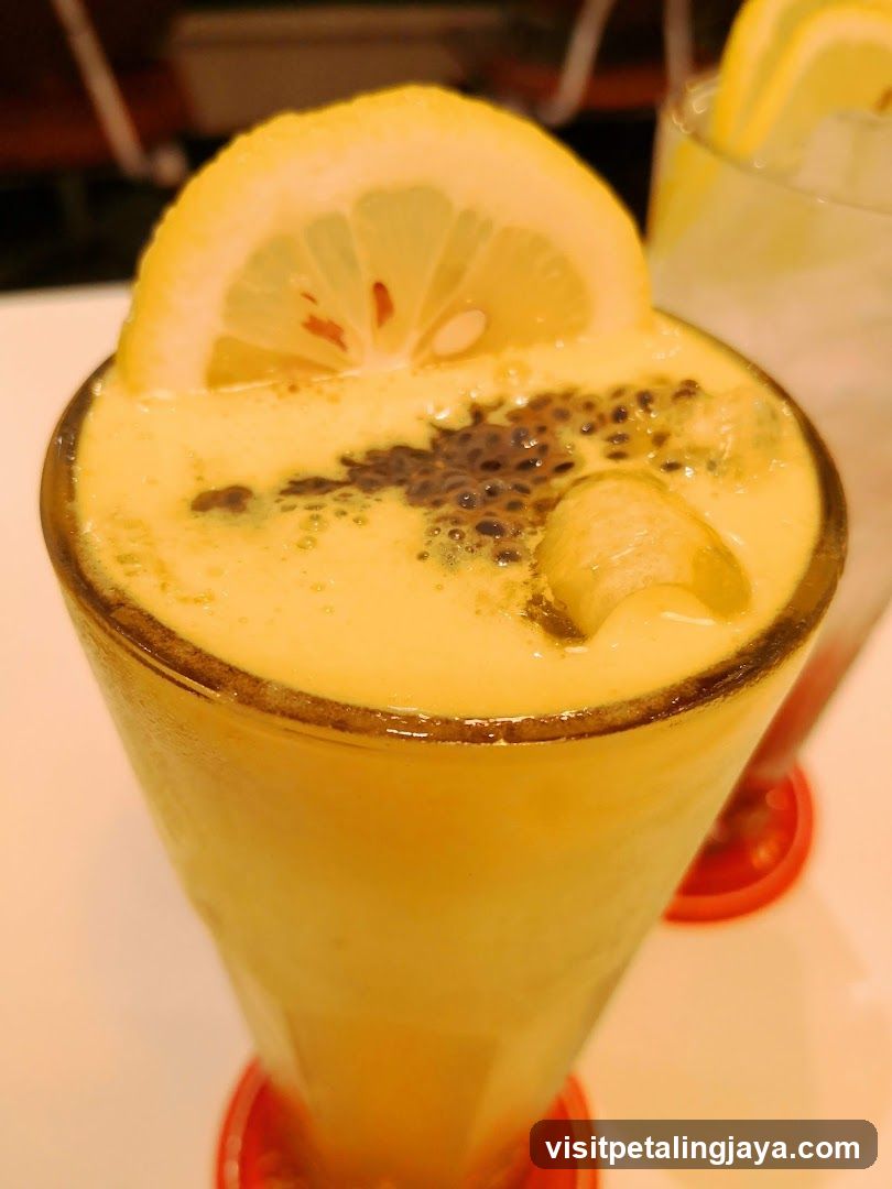 Yellow Drink with Lemon Slice