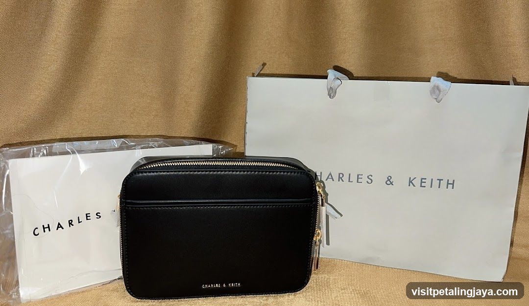 Black handbag with shopping bag