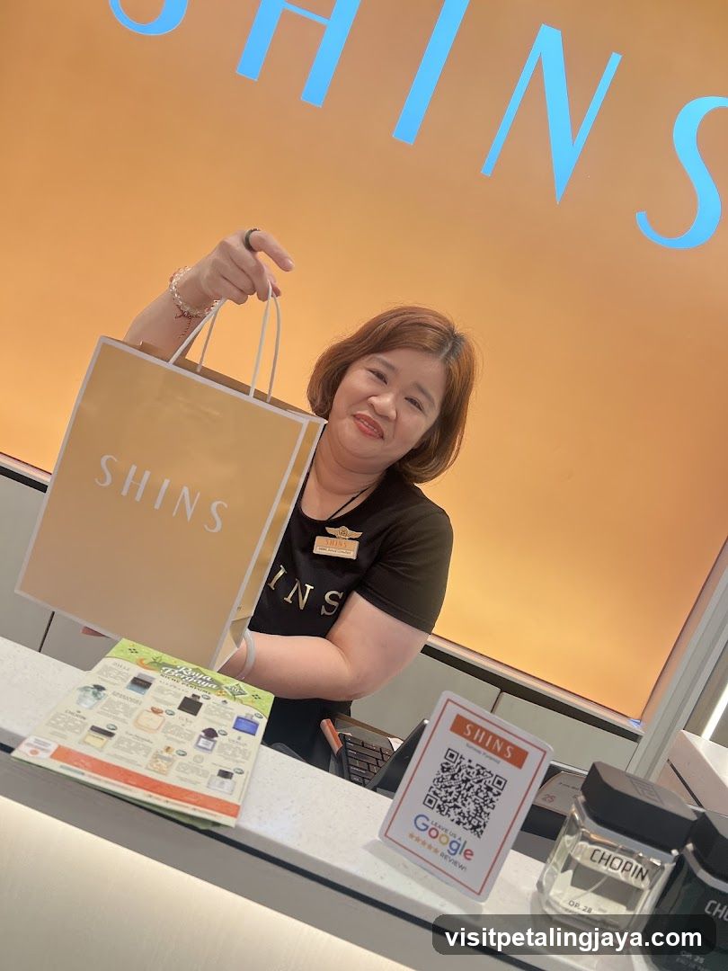 Sales Associate with Shopping Bag