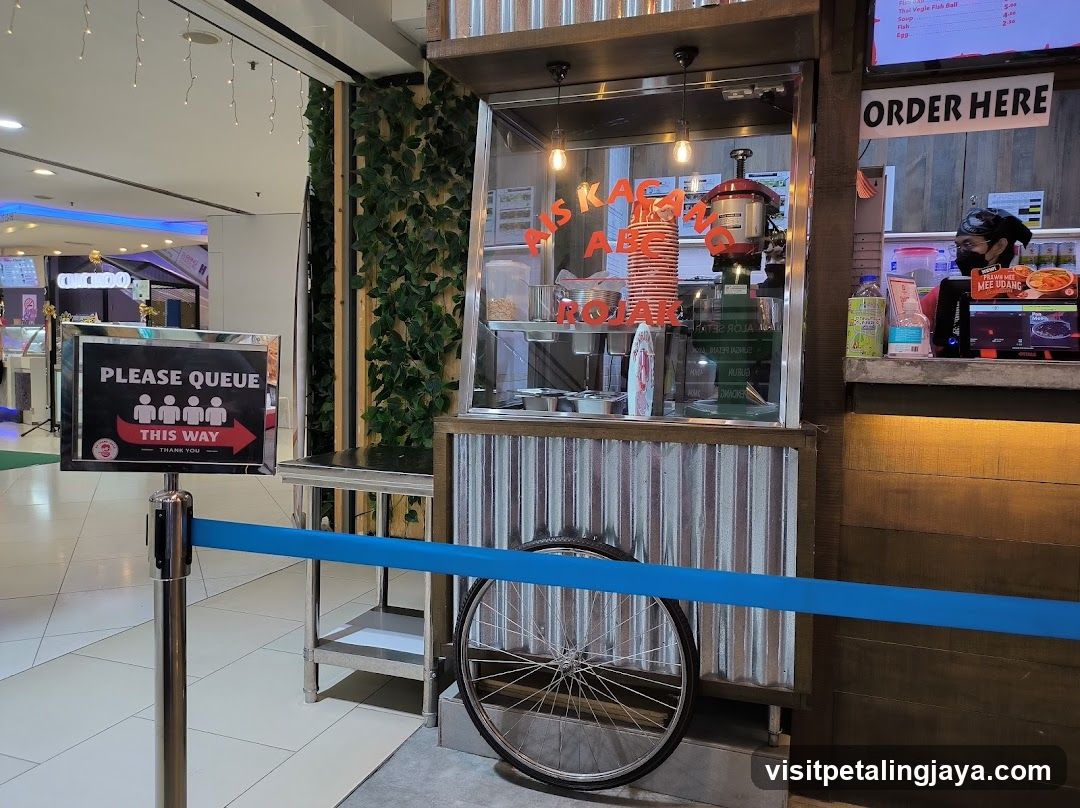 Food stall with queue signage