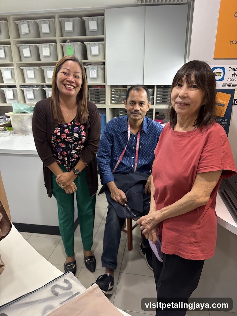Three people smiling in a store