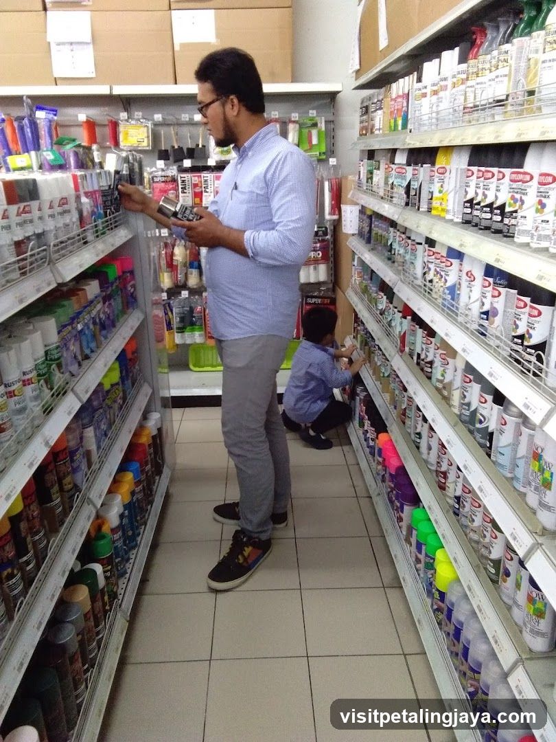 Aisle in a store with spray paint cans