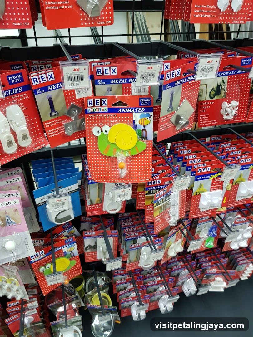 Assortment of REX brand adhesive hooks and clips