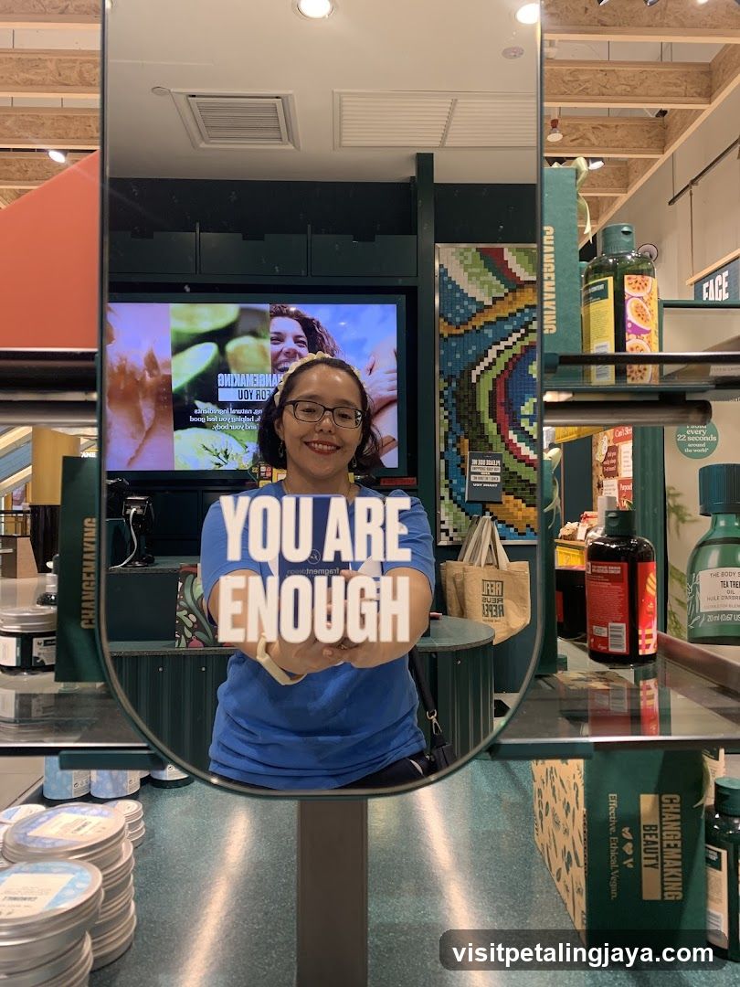Woman holding a sign in a store