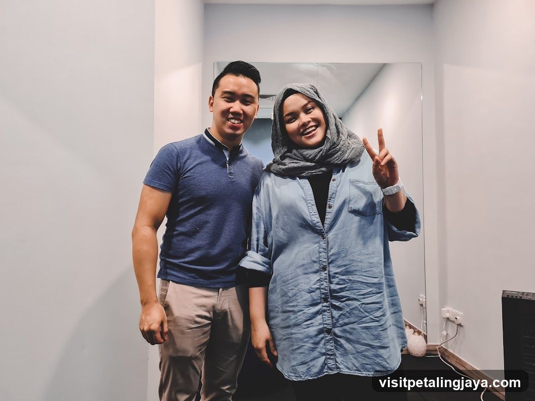 Two people posing for a photo