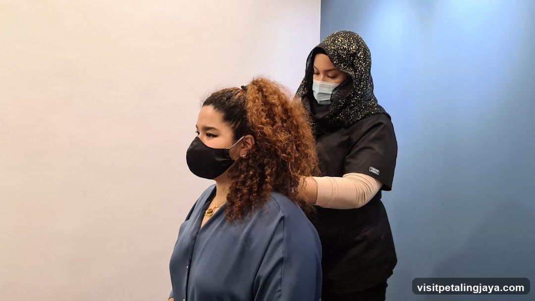 Two women in masks in a room