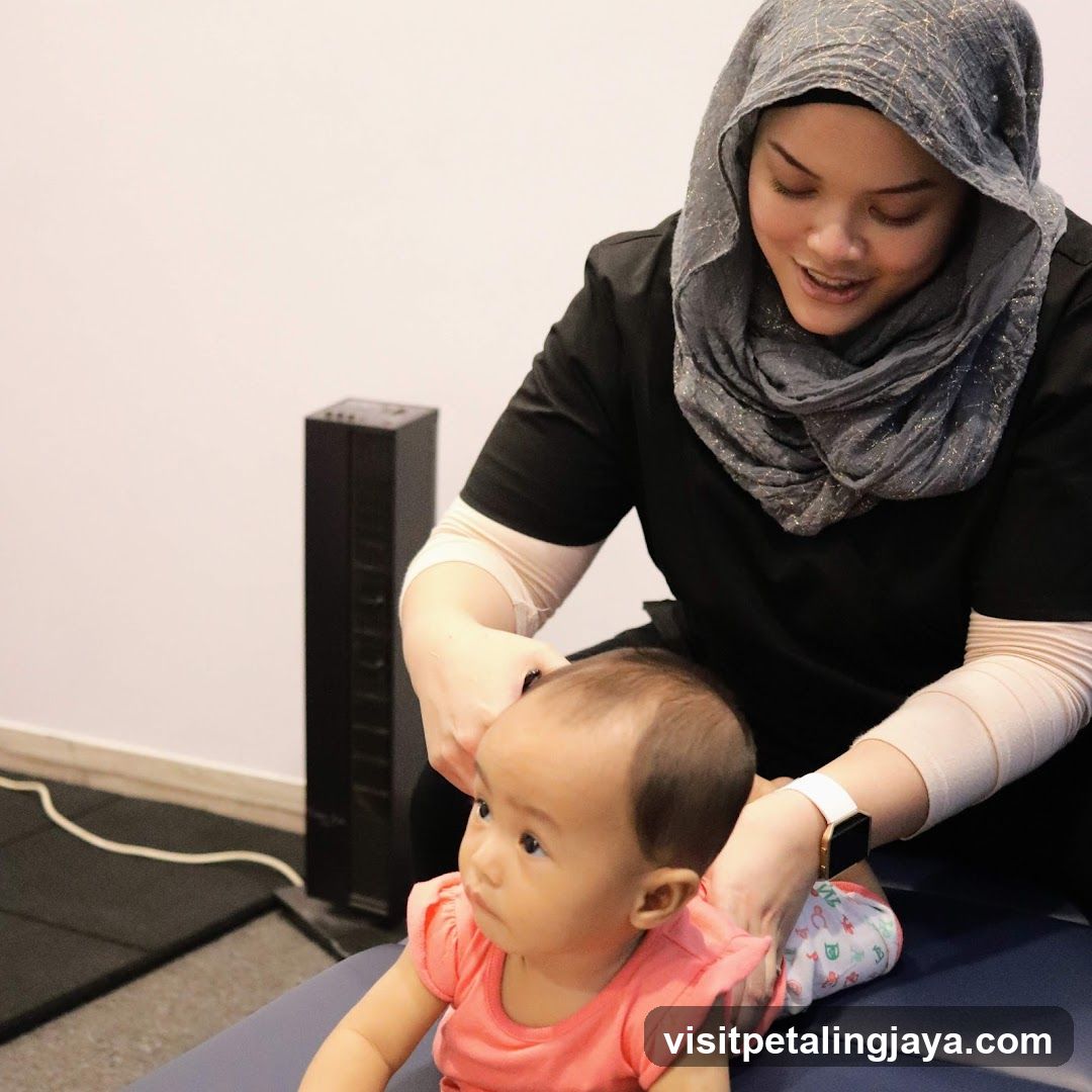 Therapist working with a baby