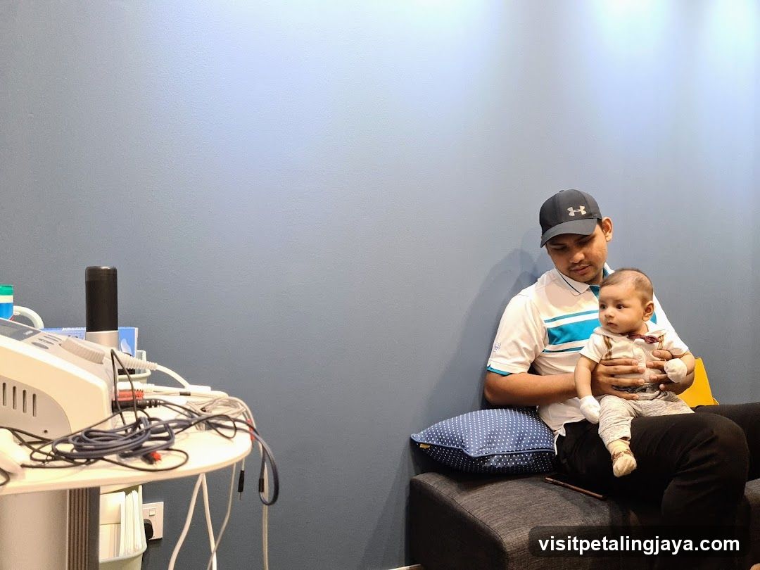 Man and baby waiting