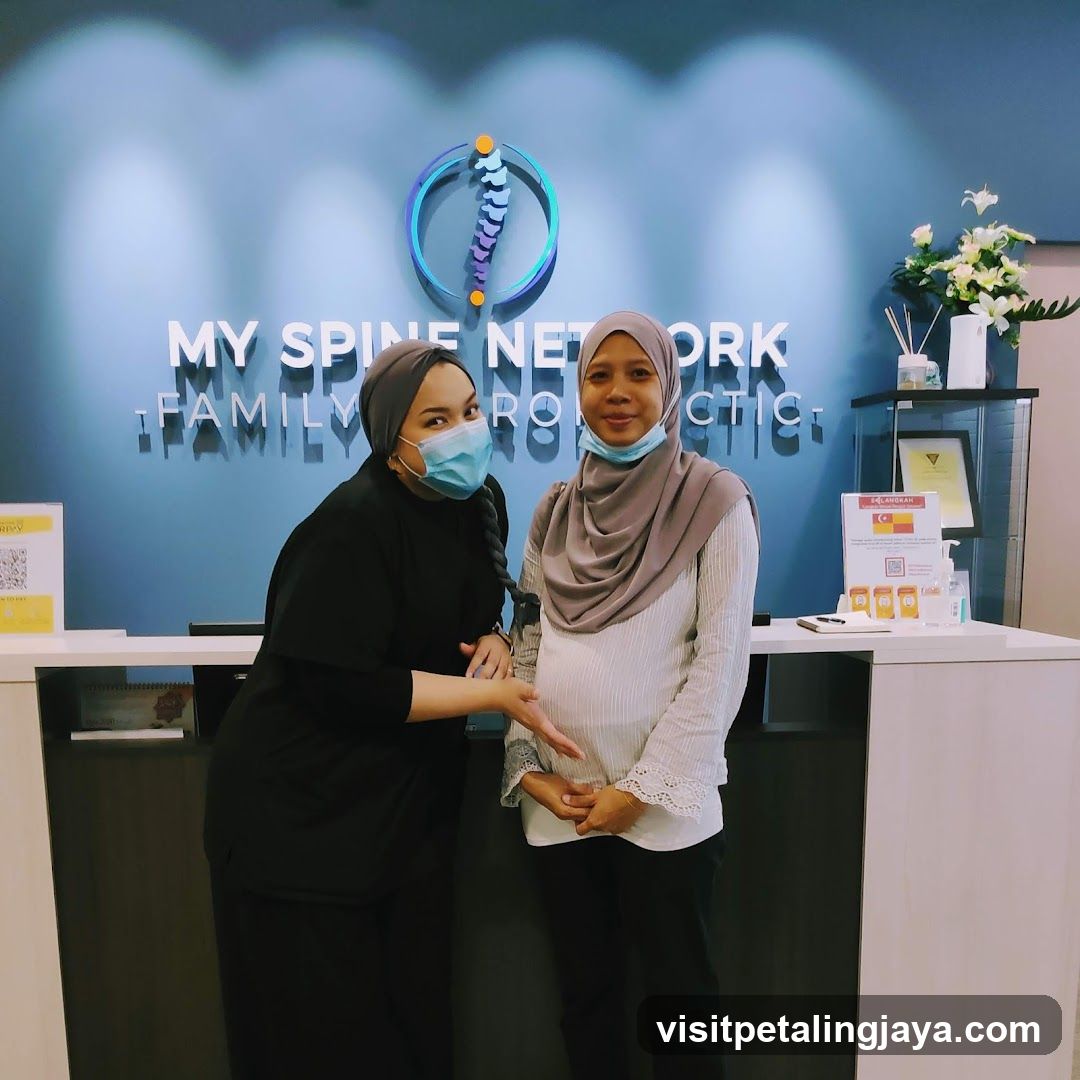 Two women at a reception desk