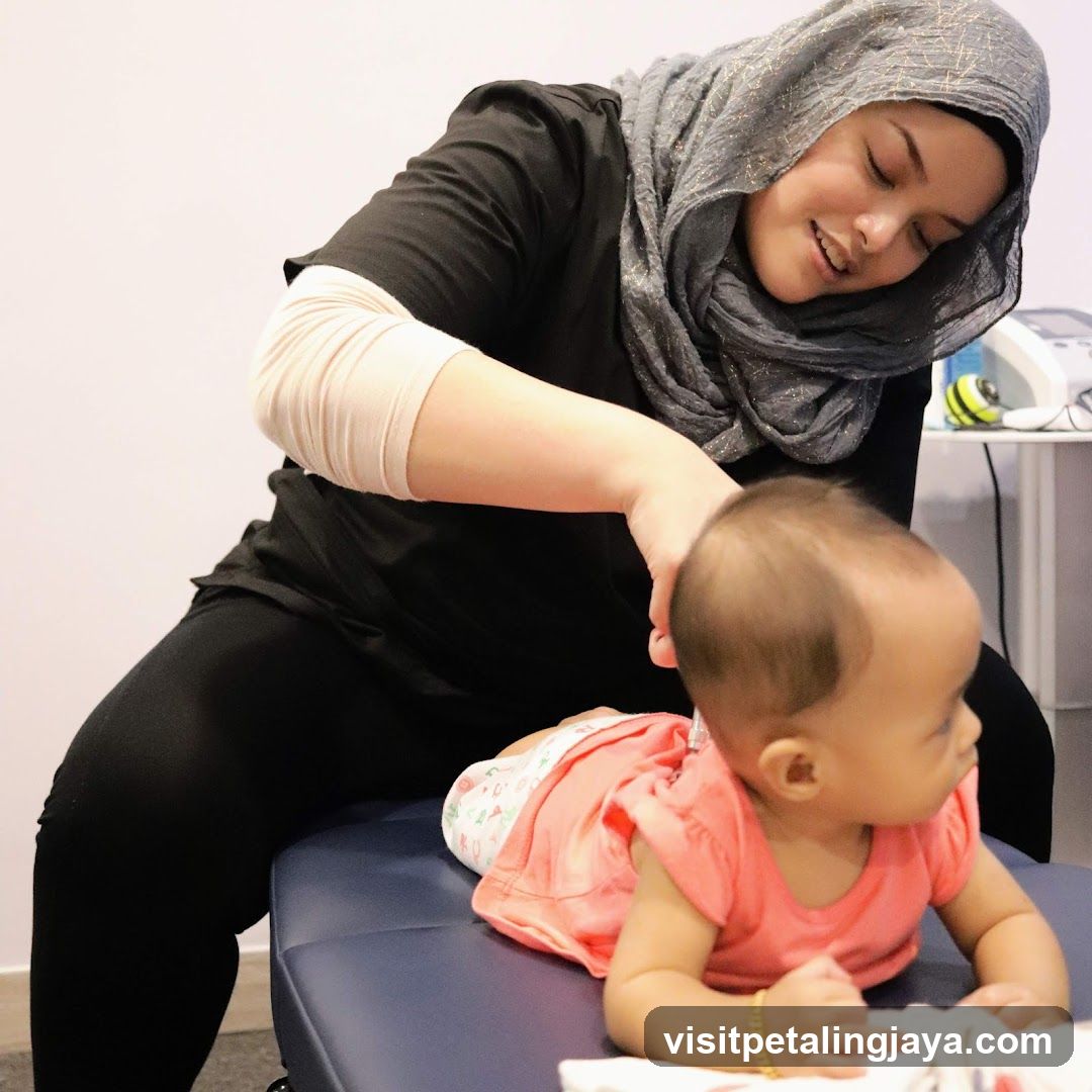 Therapist examining a baby