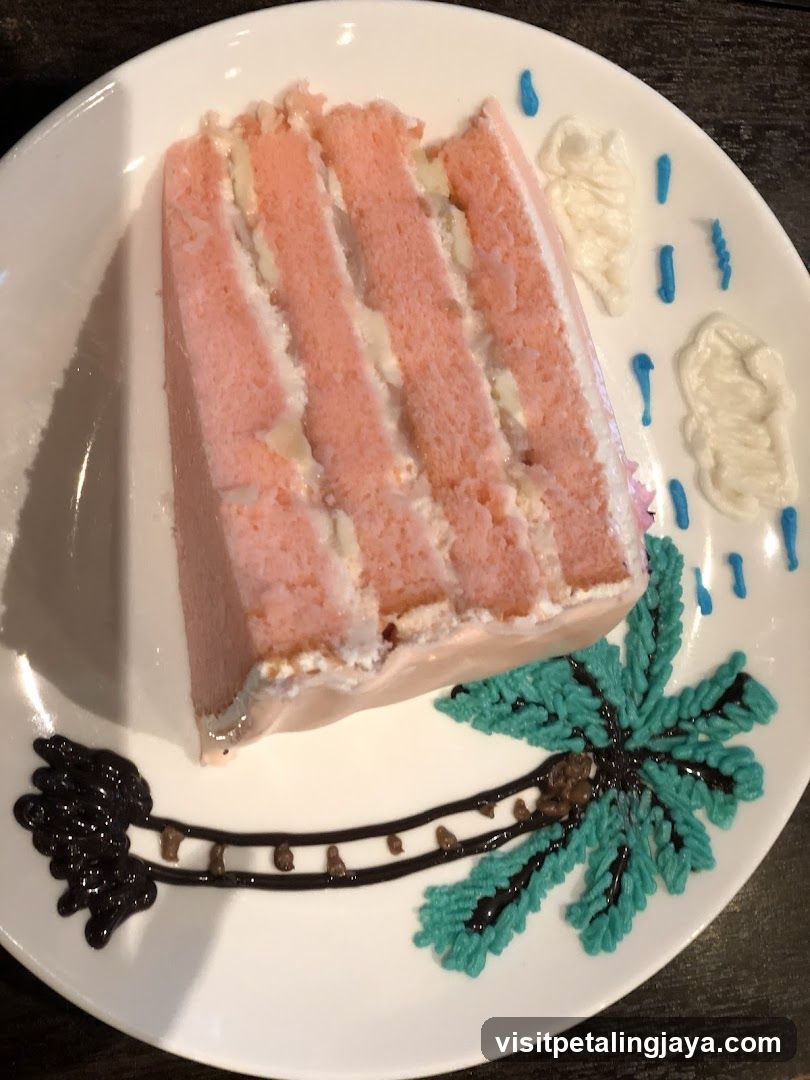 Pink Layer Cake with Tropical Decoration