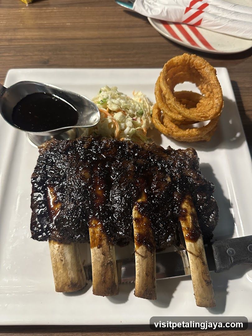 Barbecue Ribs with Onion Rings and Coleslaw