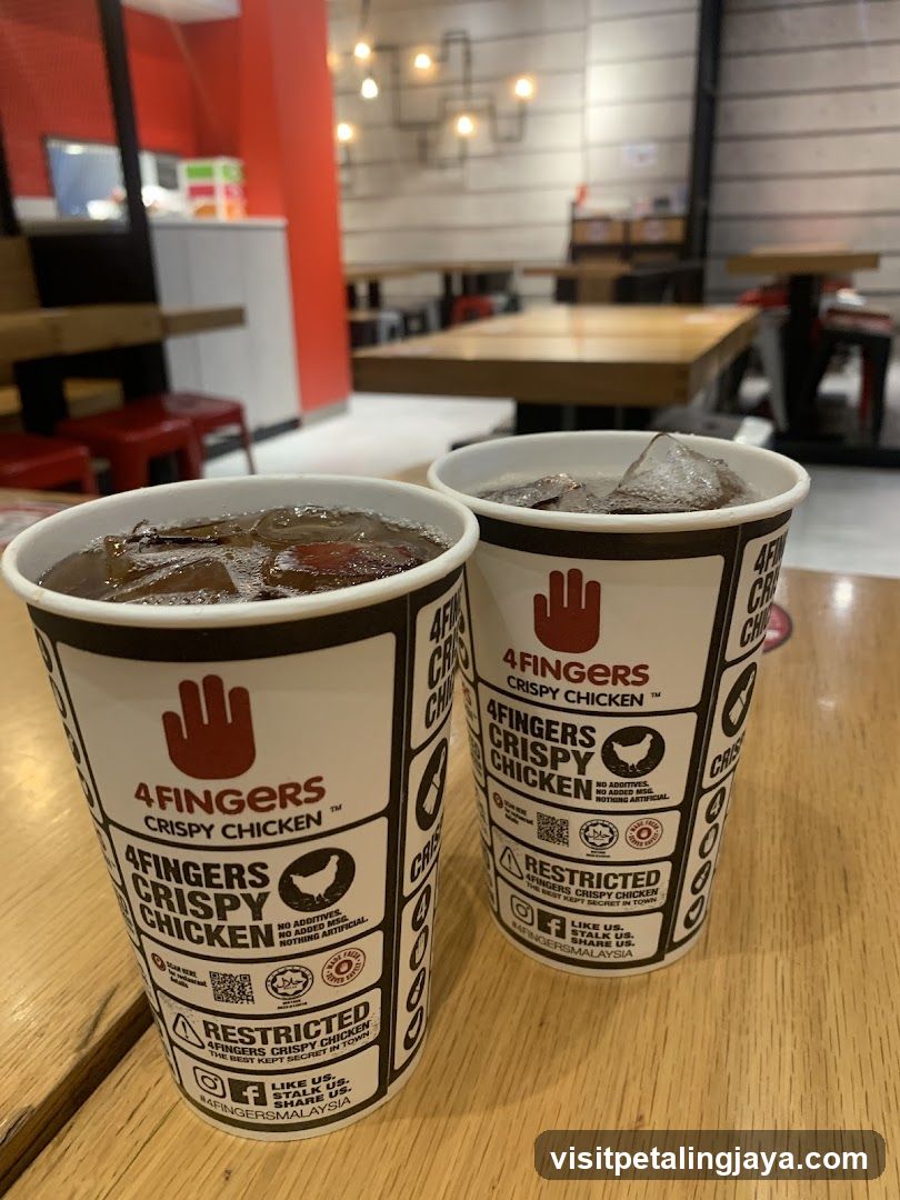 Two cups of soda with ice