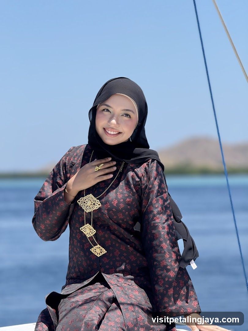 Woman in Traditional Attire on a Boat
