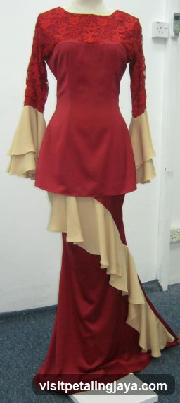 Red and beige dress on mannequin
