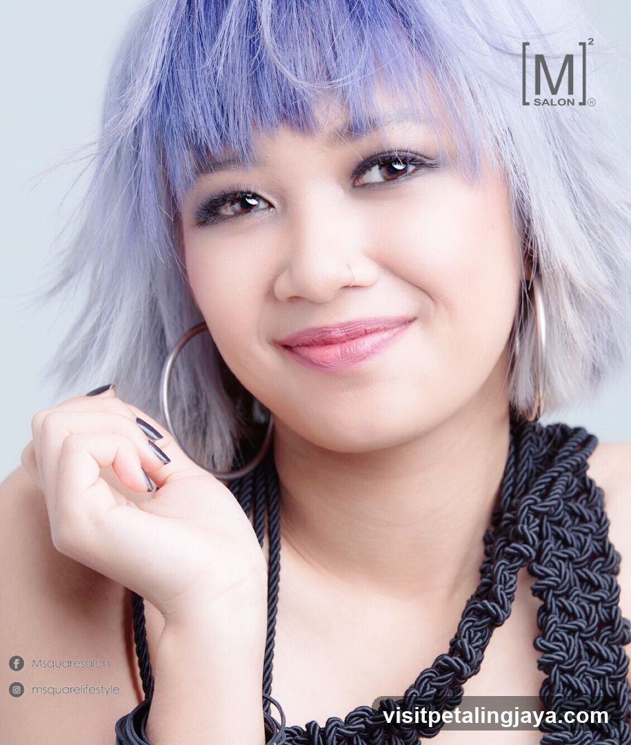 Woman with purple hair and makeup