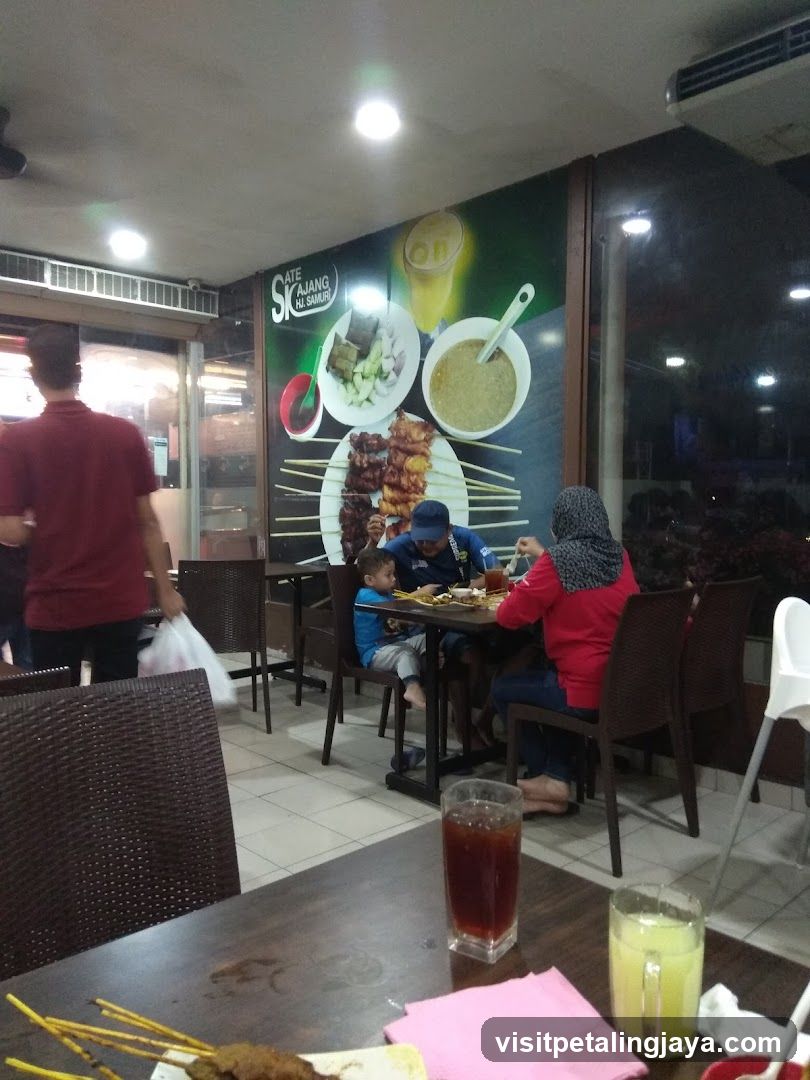 Restaurant Interior with Satay Mural