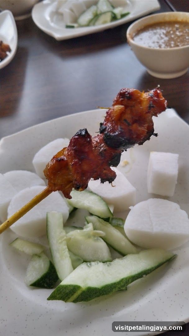 Chicken Satay with Rice Cakes and Cucumber