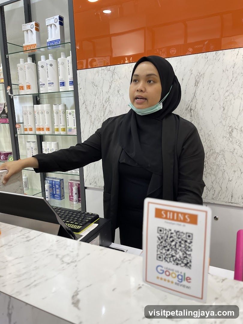 Staff member at counter
