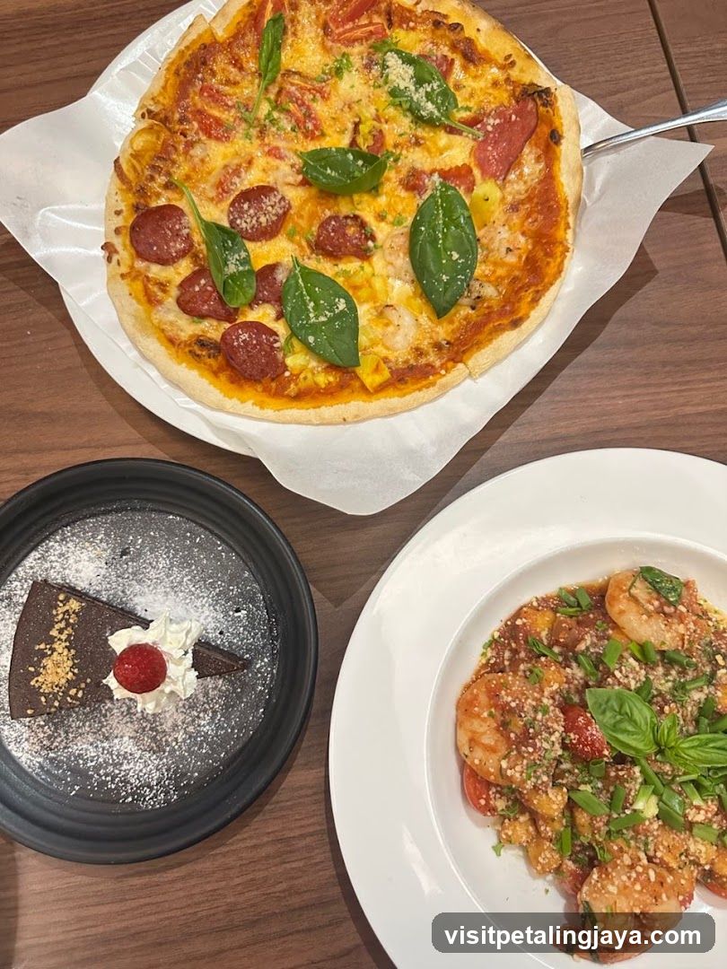 Pizza, Shrimp Dish, and Chocolate Cake