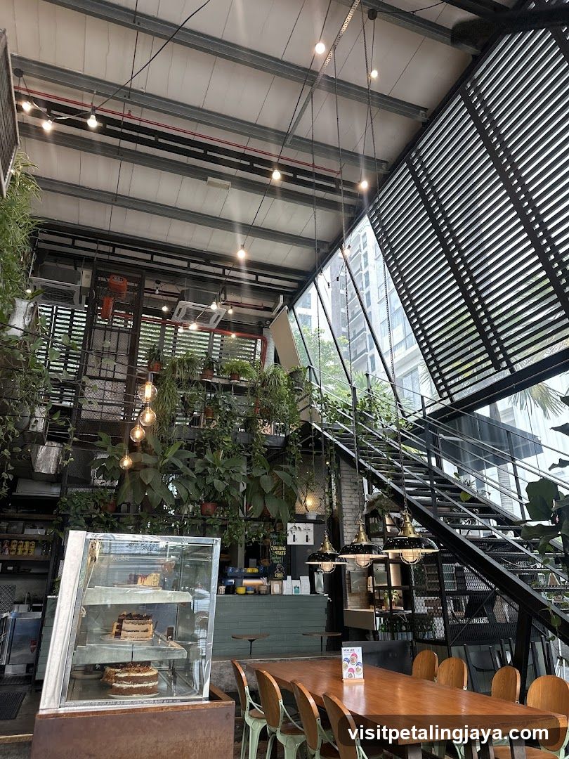 Modern Cafe Interior with Lush Greenery