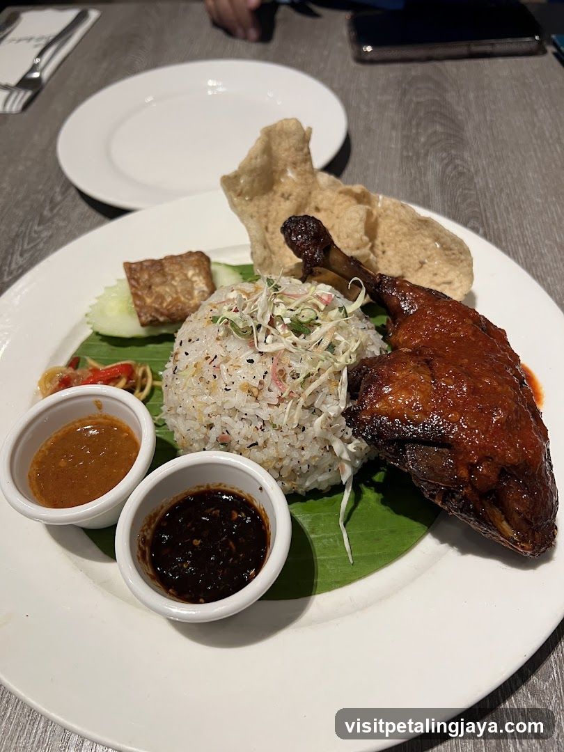 Duck dish with rice and sauces