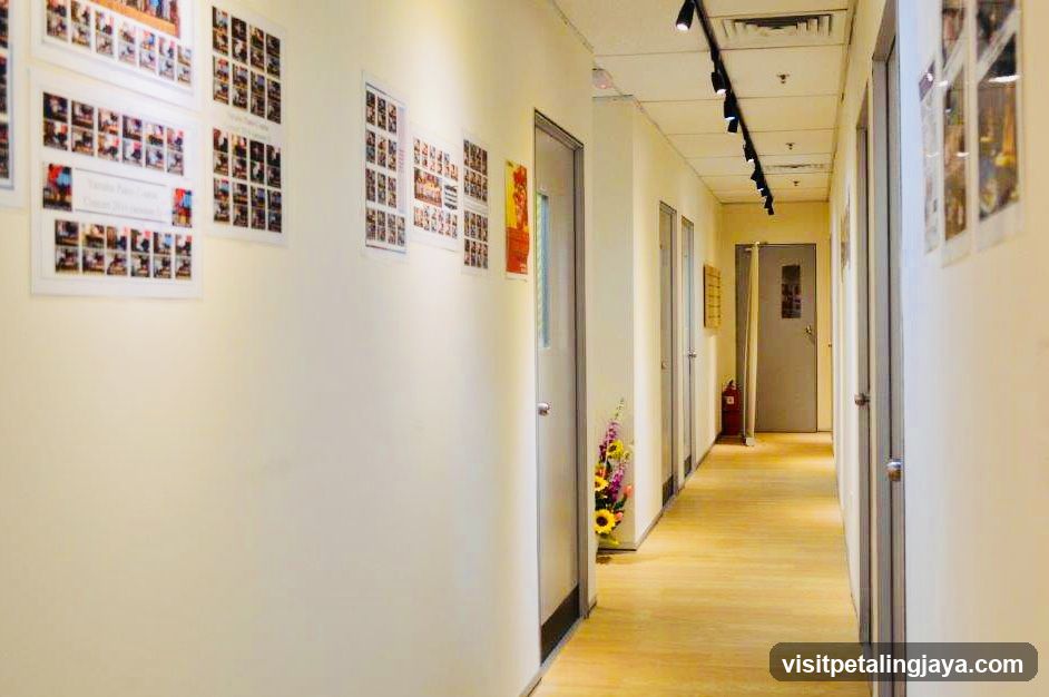 Hallway with photos and doors