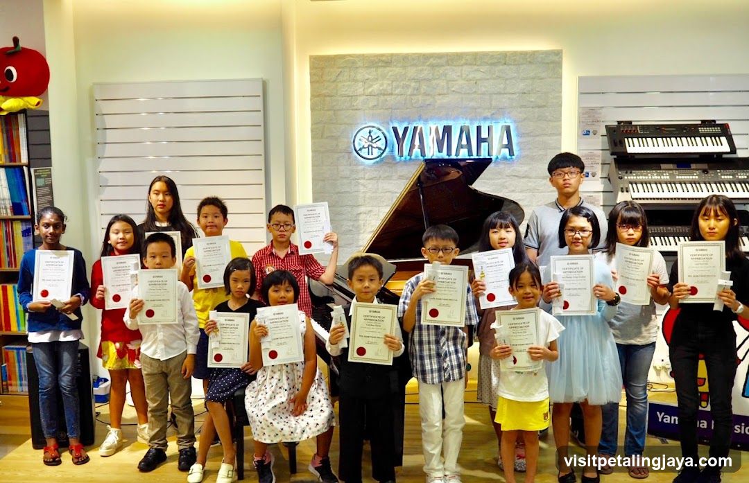 Children with Certificates at Yamaha Music School