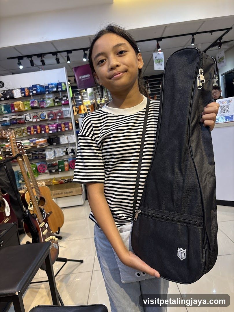 Young Girl Holding a Guitar Case