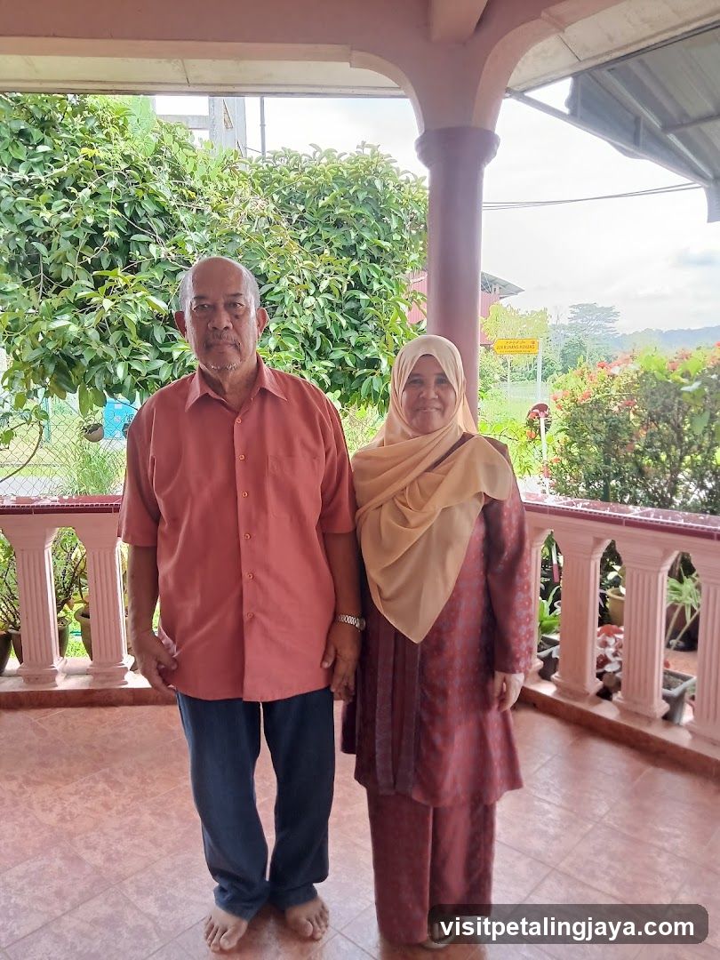 Elderly couple posing for a photo