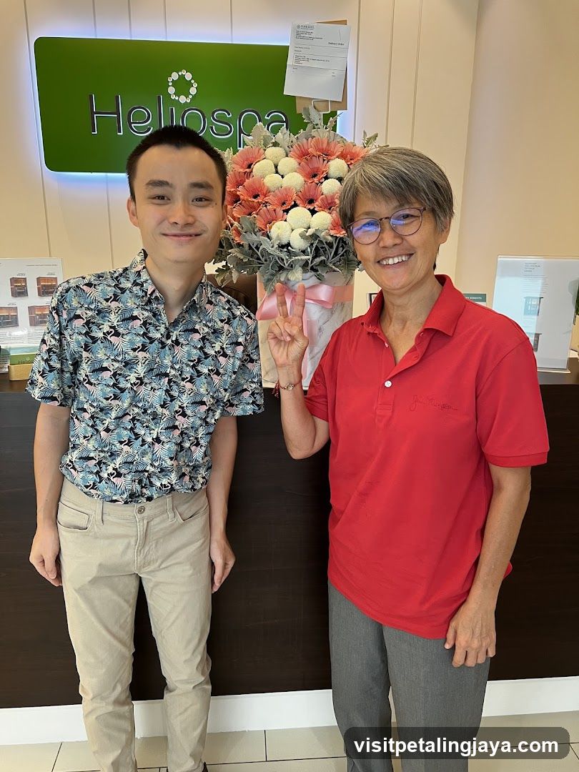 Two people in front of a spa sign