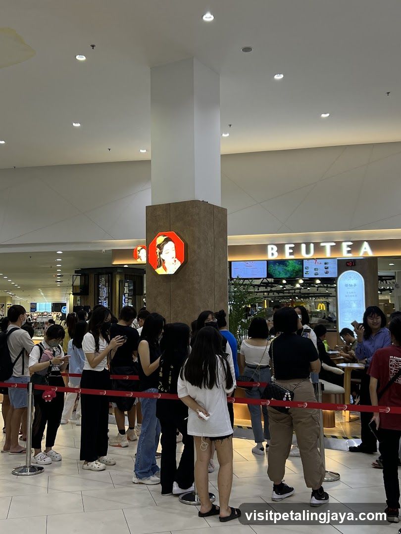 People queuing at a food establishment