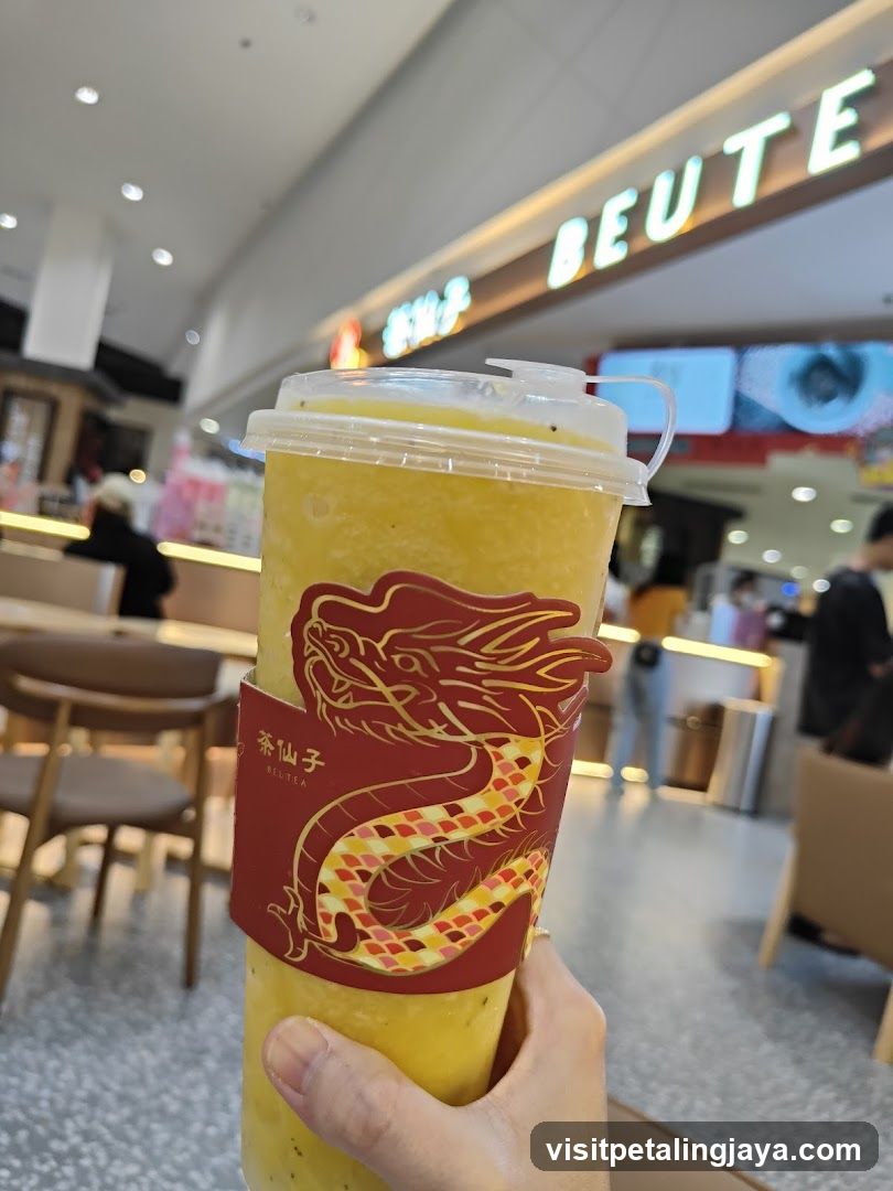 Dragon-themed cup sleeve on a yellow beverage