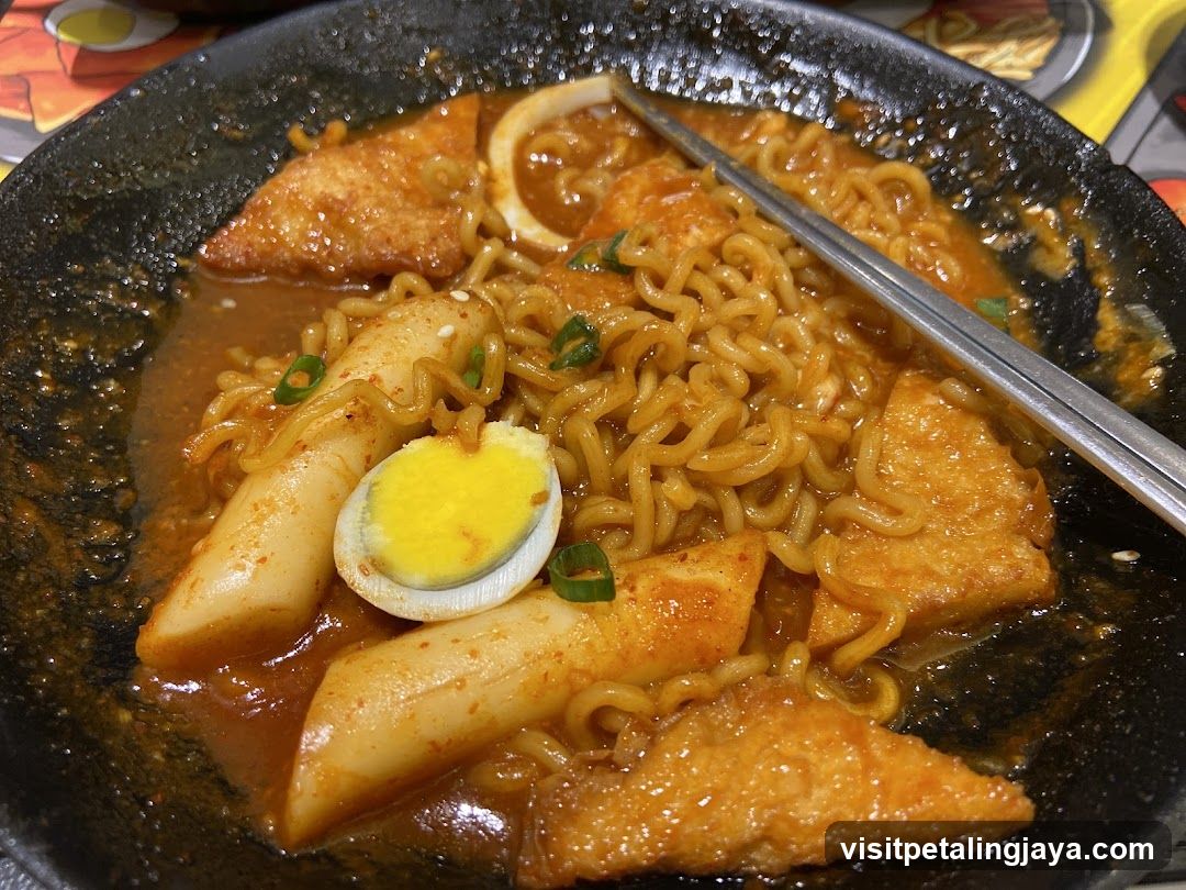 Spicy Korean Rice Cakes with Noodles and Egg