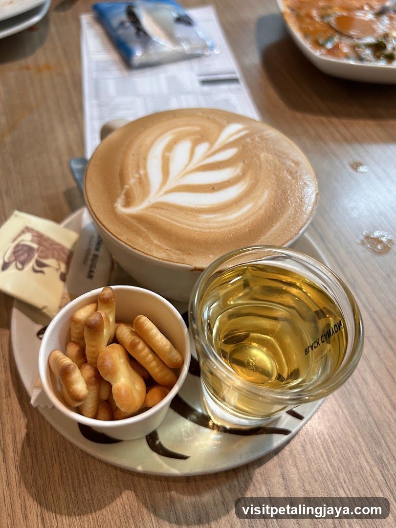Coffee with latte art and snacks