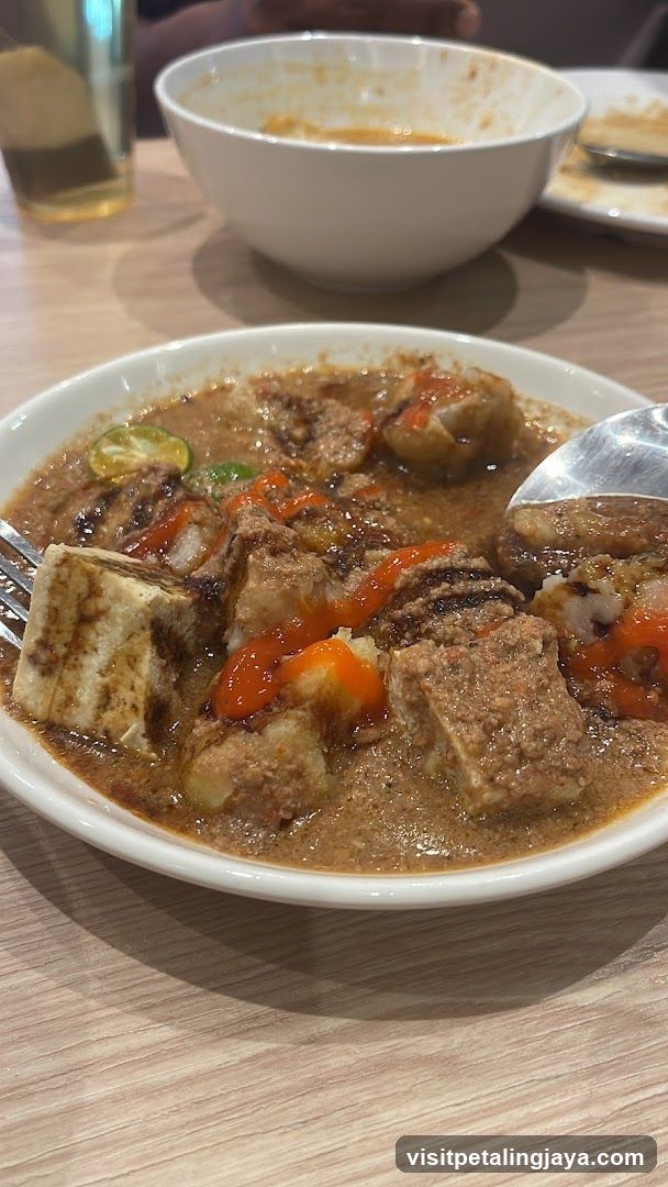 Bowl of Food with Sauce
