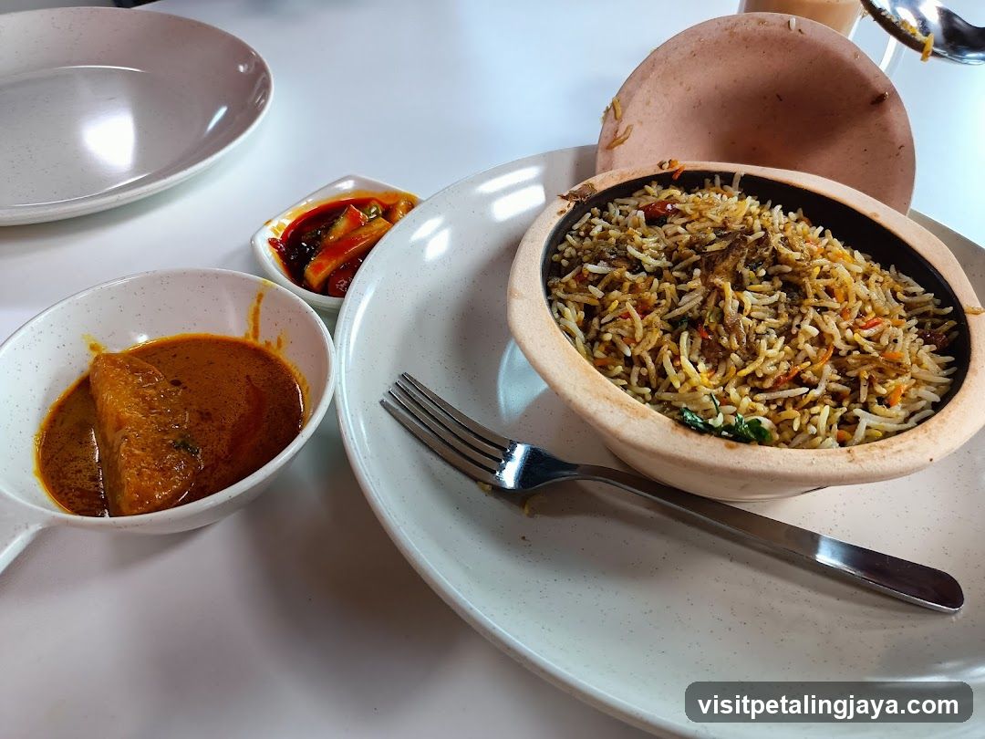 Biryani with Curry and Pickles