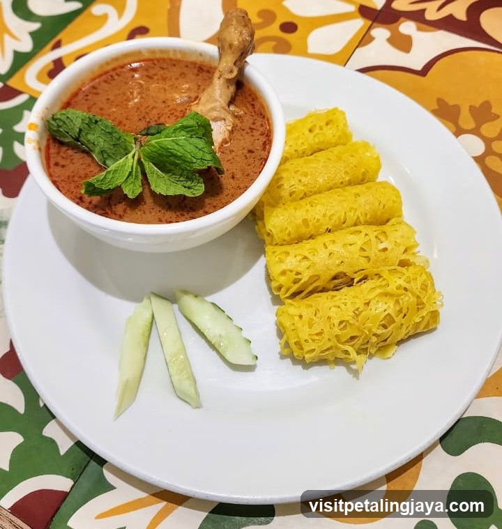 Chicken Curry with Roti Jala