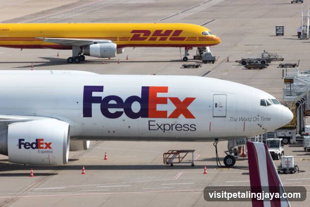 FedEx and DHL Airplanes on Tarmac