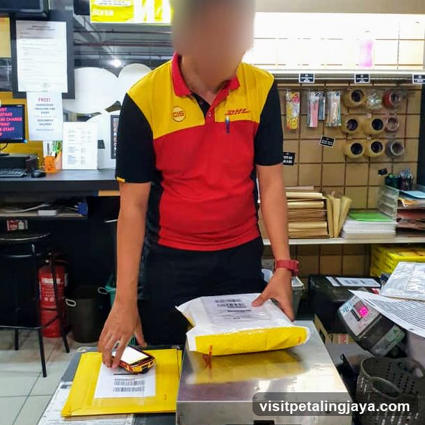 Shipping Clerk Weighing Packages