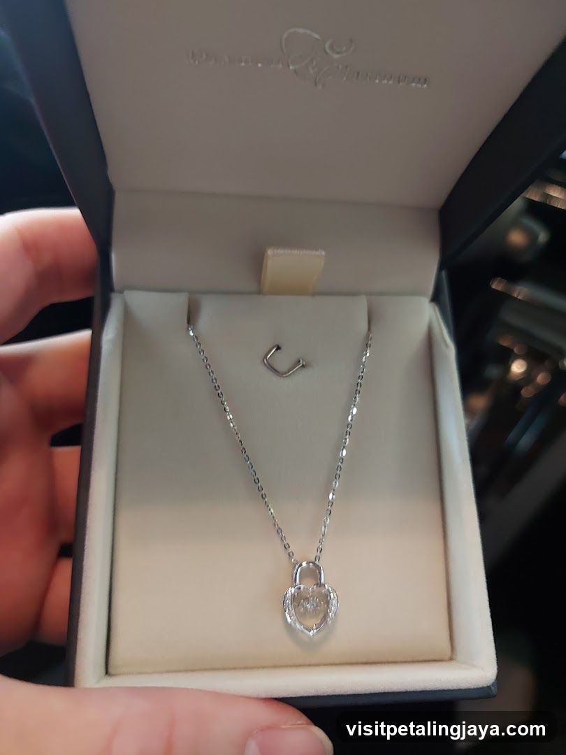 Heart-shaped locket necklace in a jewelry box