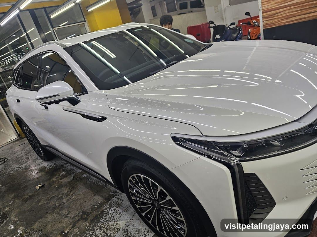 White SUV in a Garage