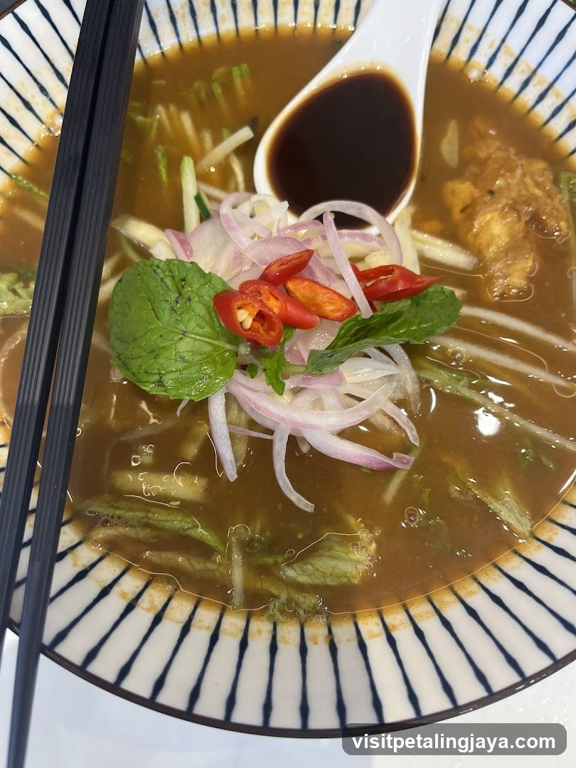Laksa with garnishes